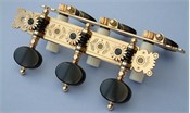 L201: Baker style engraved brass side plates, ebony oval buttons, cream colored rollers