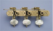 L333: Rodgers style engraved brass side plates, light mop oval buttons, cream colored rollers