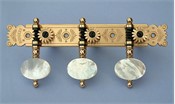 L201: Baker style engraved brass side plates, light mop oval buttons