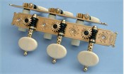 D110: Baker style engraved brass side plates, reverse gearing, synthetic ivory oval buttons, cream colored rollers