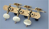 L330: Rodgers style engraved brass side plates, light mop oval buttons, cream colored rollers with self aligning bearing bushes