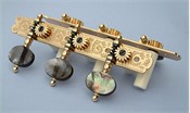 L251: Rodgers style engraved brass side plates, dark mop oval buttons, cream colored rollers